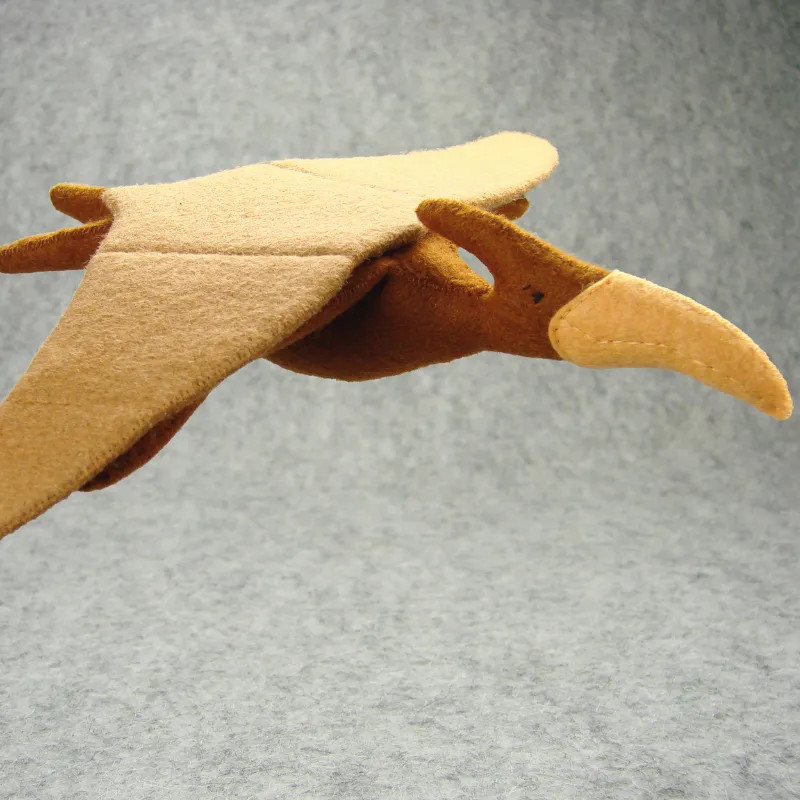 Handmade Pteranodon crafted from wool felt in various colors