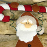 Papa Noel con bastón de caramelo